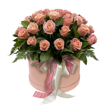 Rosas rosadas en caja — composición refinada con carácter suave y ambiente delicado