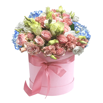 Composición en caja con hortensias, lisianthus y rosas — una creación floral elegante